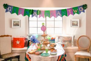 encanto birthday party DIY banner and table setting
